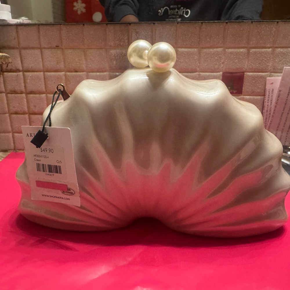 AKIRA Pearl-Inspired Cream Clutch
